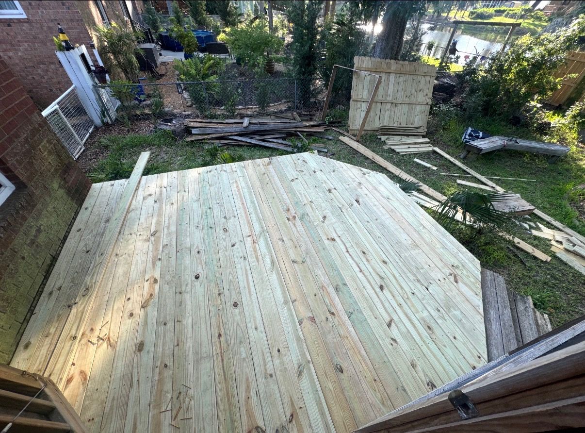 New pressure-treated deck built by Stuckey Restoration